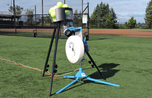 Carousel Feeder and pitching machine on field